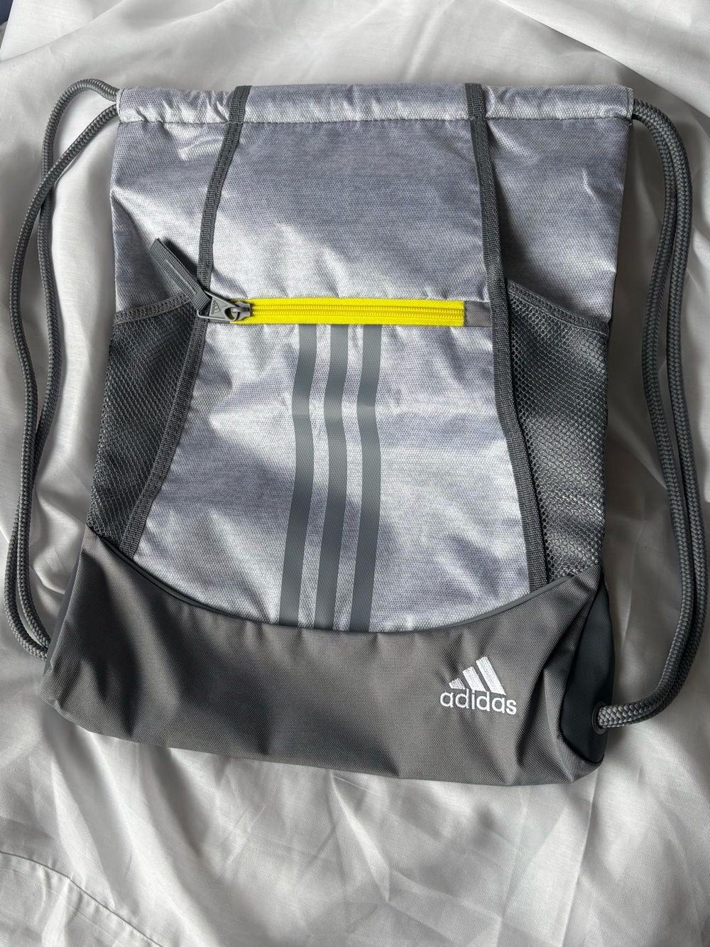 adidas Gray Silver Drawstring Backpack with Yellow Zip Accent